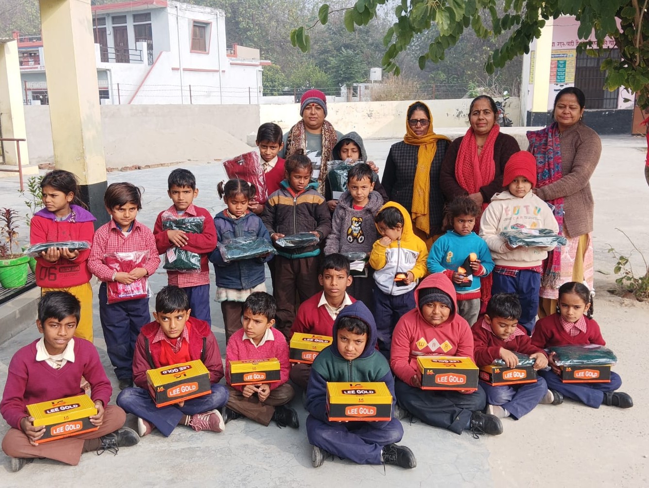 Children receiving educational materials